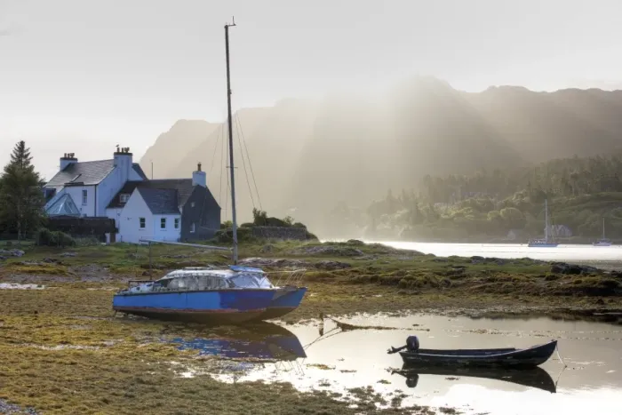 Framed Print : Early morning view of Loch Carron with sunlight bursting over distant hills Framed Print : Early morning view of Loch Carron with sunlight bursting over distant hills