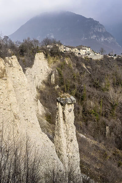 Earth pyramids (rock chimneys) with old houses of Zone, Brescia province, Lombardy, Italy