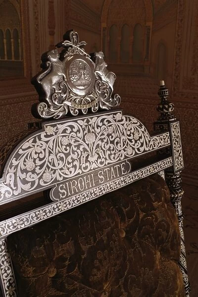 Ebony wood and ivory inlay detail on one of the pair of throne chairs