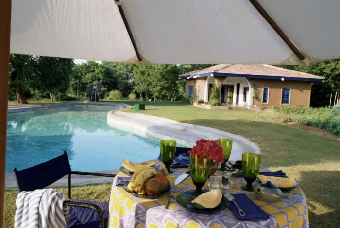 Framed Print : Eco friendly swimming pool and solar panels in background