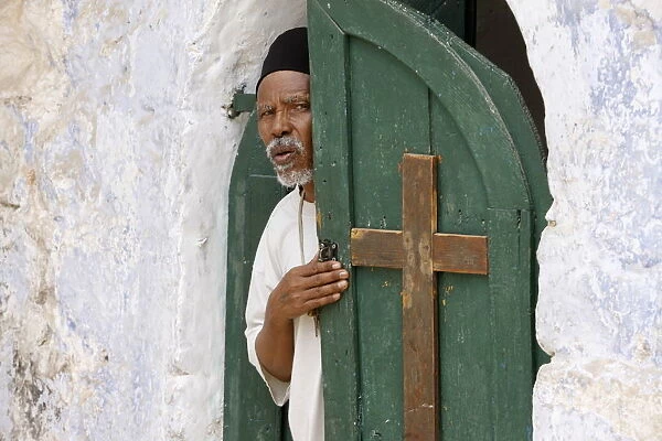 Egyptian Coptic priest at the Holy Sepulchre, Jerusalem, Israel, Middle East