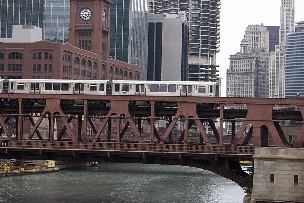 An El train on the elevated train system crossing Wells Street Bridge, Chicago