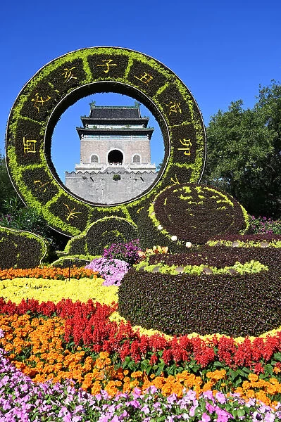Elaborate floral decorations celebrating 70 years of China framing the Bell Tower