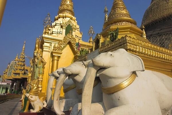 Elephant statues and shrines at Shwedagon Paya, Yangon (Rangoon), Myanmar (Burma), Asia