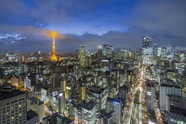 Elevated night view of the city skyline and iconic illuminated Tokyo Tower, Tokyo
