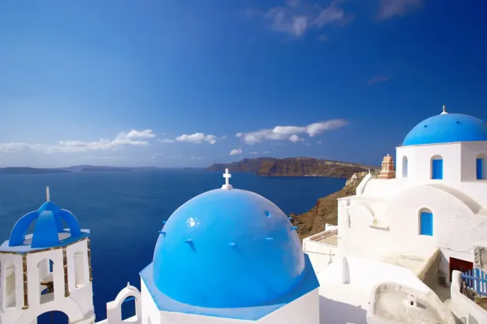 Framed Print : Elevated view of the Aegean Sea from a top of a church with blue domed roofs, Santorini Framed Print : Elevated view of the Aegean Sea from a top of a church with blue domed roofs, Santorini