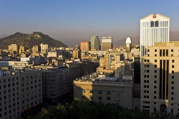 Elevated view of the central city skyline at dusk, Santiago, Chile, South America