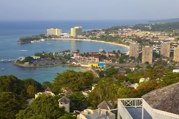 Elevated view over city and coastline, Ocho Rios, Jamaica, West Indies, Caribbean, Central America