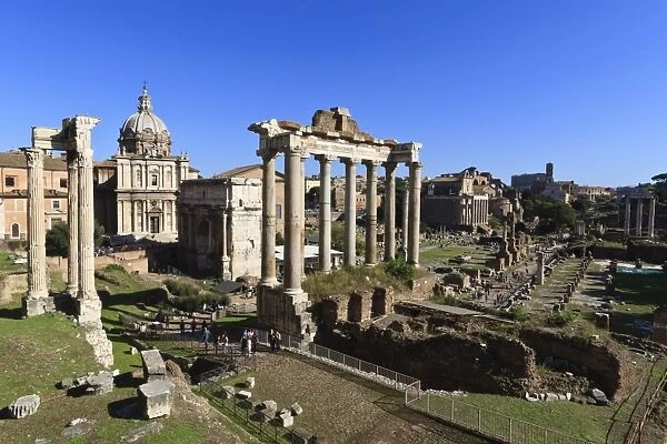 Elevated view of the columns of the Temples of Saturn and Vespasian with Santi Luca e Martina, Forum, UNESCO World Heritage Site, Rome, Lazio, Italy, Europe