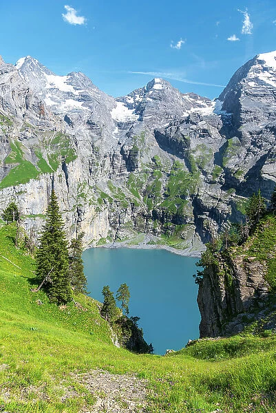Elevated view of the crystal clear water of Oeschinensee lake, Oeschinensee, Kandersteg, Bern Canton, Switzerland, Europe