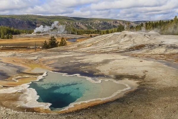 Elevated view of Doublet Pool, Firehole River and Castle Geyser, Upper Geyser Basin, Yellowstone National Park, UNESCO World Heritage Site, Wyoming, United States of America, North America