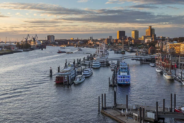 Elevated view from the Elbphilharmonie building over the port of Hamburg at sunset