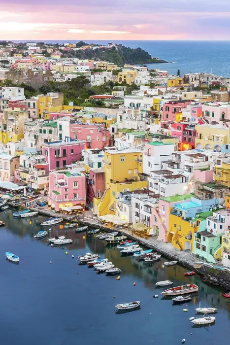 Framed Print : Elevated view of the fishing village of Marina Corricella with colorful houses, Procida island, Tyrrhenian Sea, Naples district, Naples Bay, Campania region, Italy, Europe Framed Print : Elevated view of the fishing village of Marina Corricella with colorful houses, Procida island, Tyrrhenian Sea, Naples district, Naples Bay, Campania region, Italy, Europe