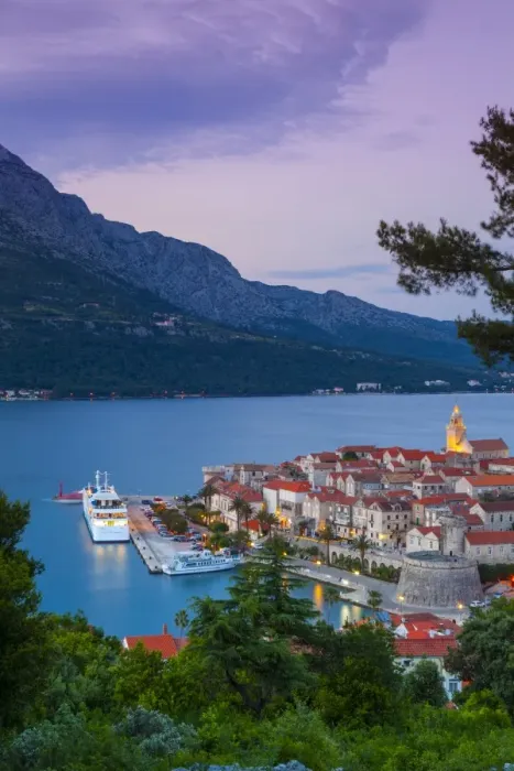 Framed Print : Elevated view over Korculas picturesque Stari Grad (Old Town) illuminated at dusk, Korcula Town, Korcula, Dalmatia, Croatia, Europe