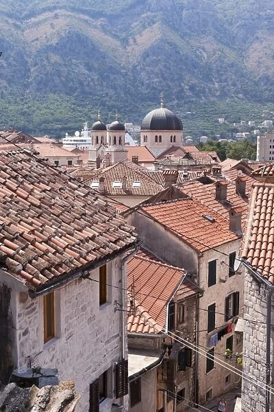 Elevated view of red roof tiles and the domes of the Church of St. Nicholas, Kotor, UNESCO World Heritage Site, Montenegro, Europe