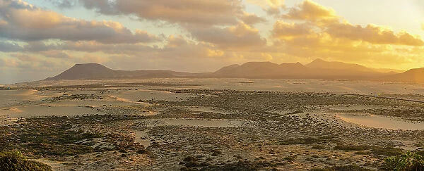 Elevated view of sand dunes and mountains at sunset, Corralejo Natural Park, Fuerteventura, Canary Islands, Spain, Atlantic, Europe
