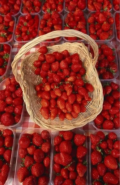 Elevated View of Strawberries in a Basket and Boxes
