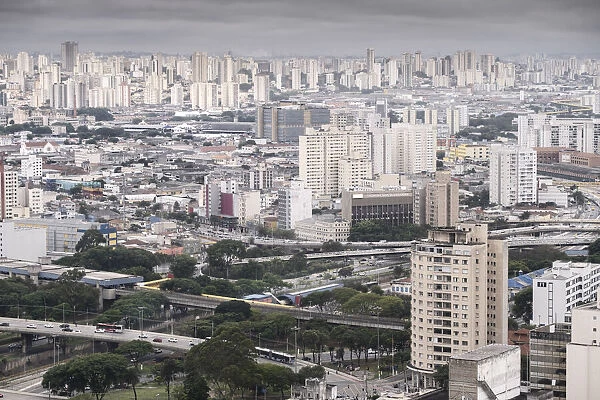 Elevated view of urban highways, Avenida do Estado and Diario Popular bridge, downtown and concrete buildings, Sao Paulo, Brazil, South America