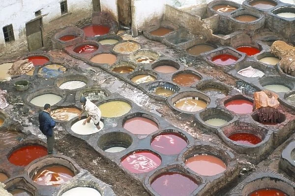 Elevated view over vats of dye