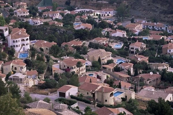 Elevated view of villa development on hillside