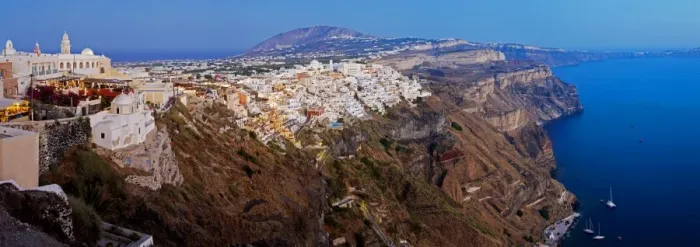 Framed Print : Elevated view over the volcanic landscape and main town of Fira, Santorini (Thira)