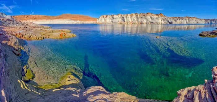 Framed Print : The emerald blue waters of Lake Powell just north of the Glen Canyon Dam in an area Framed Print : The emerald blue waters of Lake Powell just north of the Glen Canyon Dam in an area