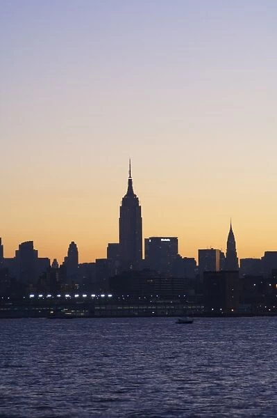 Empire State Building and Midtown Manhattan skyline at sunrise
