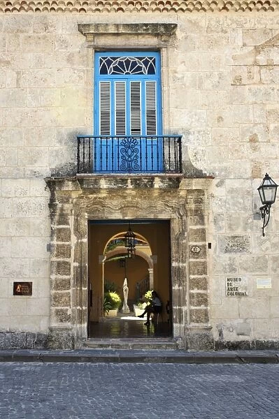 Entrance of the Casa del Conde de Casa Bayona (House of the Count of the House of Bayona) dated 1720, now the Museum of Colonial Art, Plaza de la Catedral, Old Havana (Habana Vieja), Havana, Cuba, West Indies