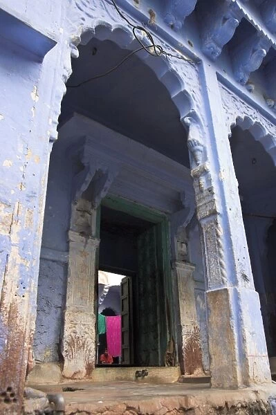 Entrance porch of blue painted residential haveli