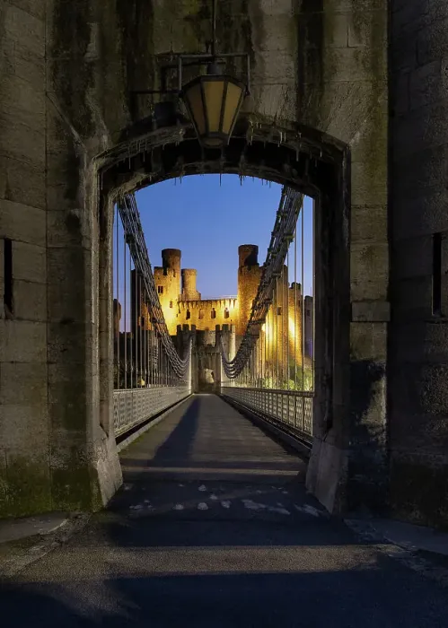 Framed Print : Entrance to Telford's Conwy Suspension Bridge and Conwy Castle at night, UNESCO World Heritage Site, Conwy, North Wales, United Kingdom, Europe Framed Print : Entrance to Telford's Conwy Suspension Bridge and Conwy Castle at night, UNESCO World Heritage Site, Conwy, North Wales, United Kingdom, Europe