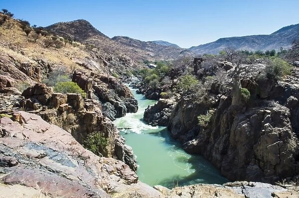 Epupa Falls on the Kunene River on the border between Angola and Namibia, Namibia, Africa