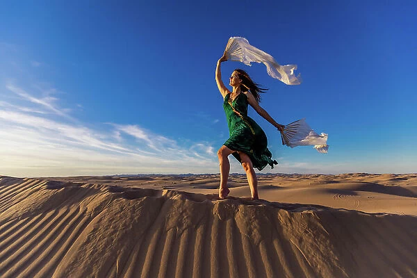 Ethereal woman at the Imperial Sand Dunes, California, United States of America, North America