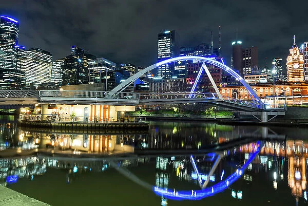 Evan Walker Bridge, and Flinders Street Station along Yarra River, City of Melbourne at twillight, Victoria, Australia, Pacific