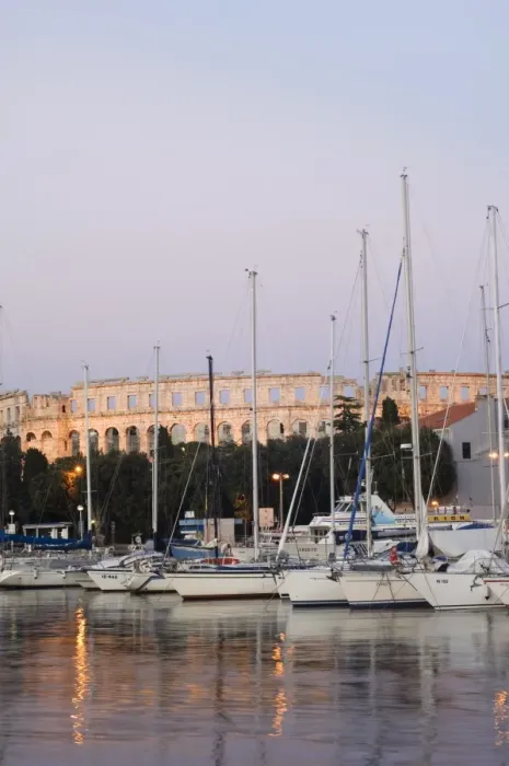 Framed Print : Evening light on harbour yachts, and 1st century Roman amphitheatre, Pula Framed Print : Evening light on harbour yachts, and 1st century Roman amphitheatre, Pula