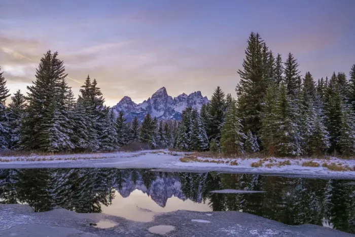Framed Print : Evening light and reflection of Teton Range in snowy pond, Grand Teton National Park