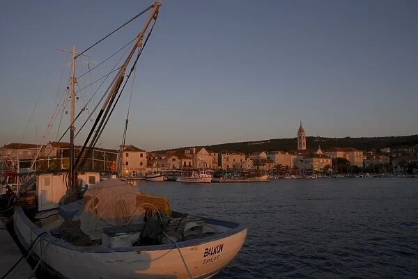 Evening light in Supetar, with fishing boat in front, Brac, Dalmatian Coast