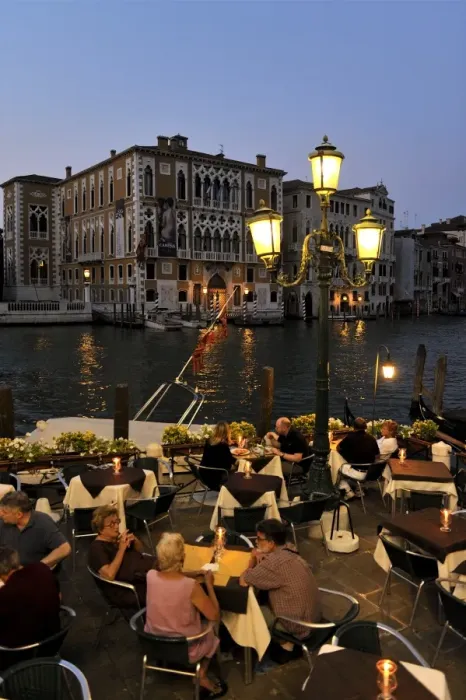 Framed Print : Evening view of a restaurant beside the Grand Canal, Venice UNESCO World Heritage Site Framed Print : Evening view of a restaurant beside the Grand Canal, Venice UNESCO World Heritage Site