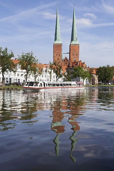 Excursion boat on the River Trave and cathedral, Stadttrave, Lubeck, Schleswig Holstein, Germany, Europe