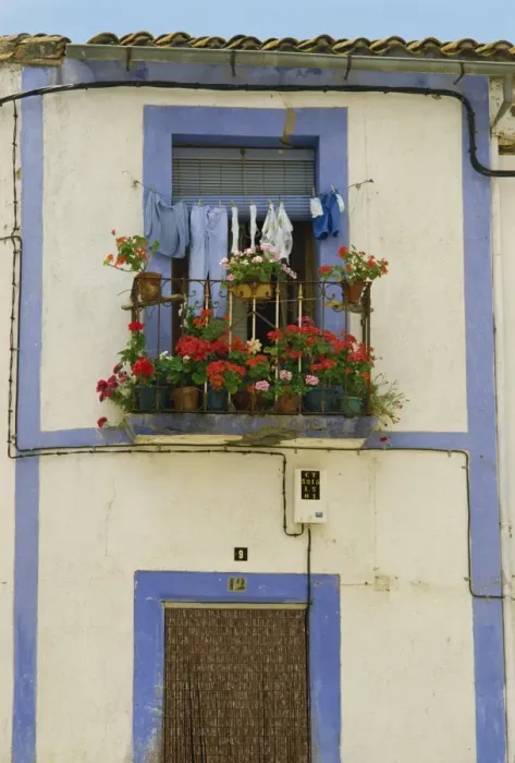 Framed Print : Exterior detail of a house painted blue and white Framed Print : Exterior detail of a house painted blue and white