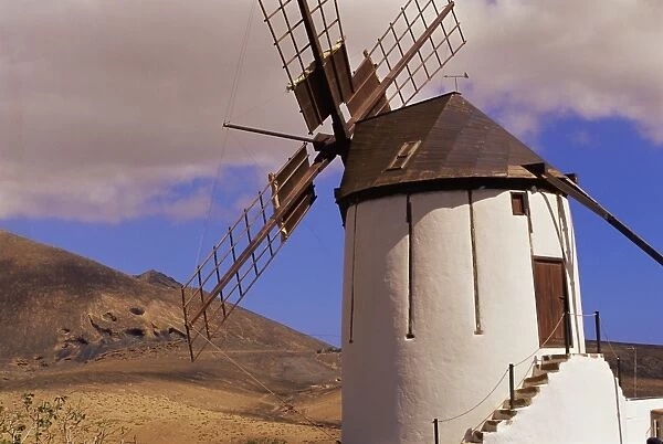 Exterior of old windmill in volcanic landscape