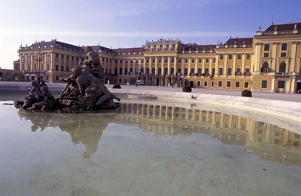 Exterior of the Schloss Schonbrunn (Schonbrunn Palace), with fountain and pool in front
