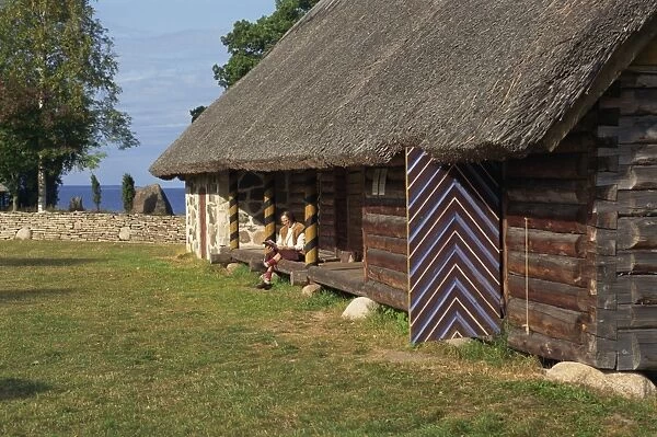 Exterior of a thatched wooden house, Folklore Park near Tallinn with many old Estonian houses