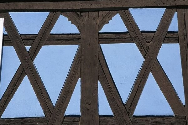 Detail of exterior wall of half timbered house showing pattern of beams