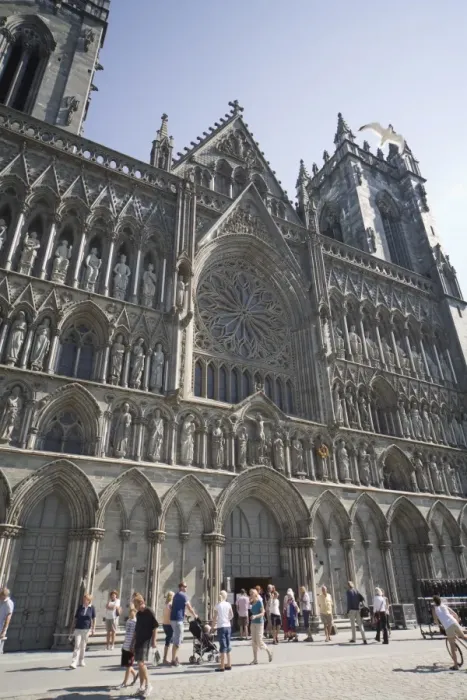 Framed Print : Exterior of the west front, with seagull flying over, Nidaros Cathedral Framed Print : Exterior of the west front, with seagull flying over, Nidaros Cathedral