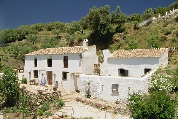 Exterior of a white walled house in the countryside near Malaga