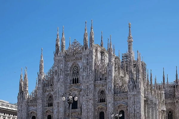 Facade of Milan Cathedral (Duomo di Milano), dedicated to the Nativity of St. Mary, seat of the Archbishop, Milan, Lombardy, Italy, Europe