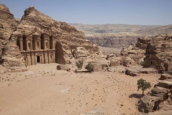 The facade of the Monastery carved into the red rock at Petra, UNESCO World Heritage Site, Jordan, Middle East