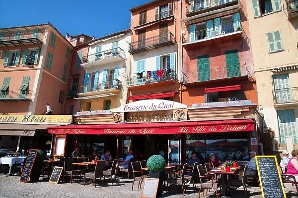 Facade of restaurants along waterfront, Villefranche, Alpes-Maritimes, Provence-Alpes-Cote d Azur, French Riviera, France, Europe