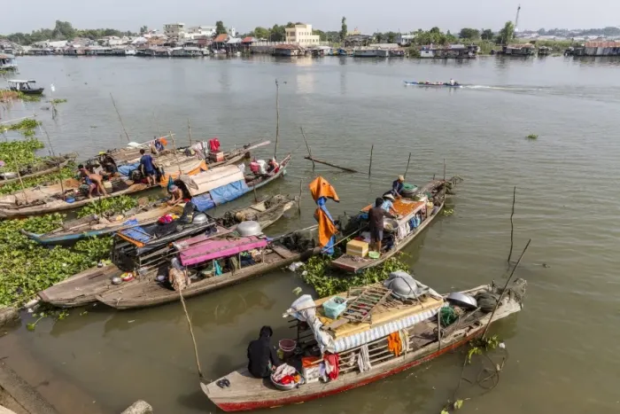 Framed Print : Families in their river boats at the local market in Chau Doc, Mekong River Delta Framed Print : Families in their river boats at the local market in Chau Doc, Mekong River Delta