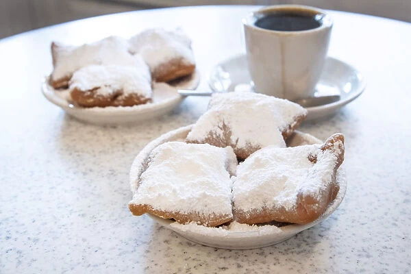 Famous food of New Orleans: beignets and chicory coffee at Cafe Du Monde, New Orleans